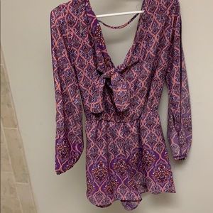 Trendy purple Romper Open back and V